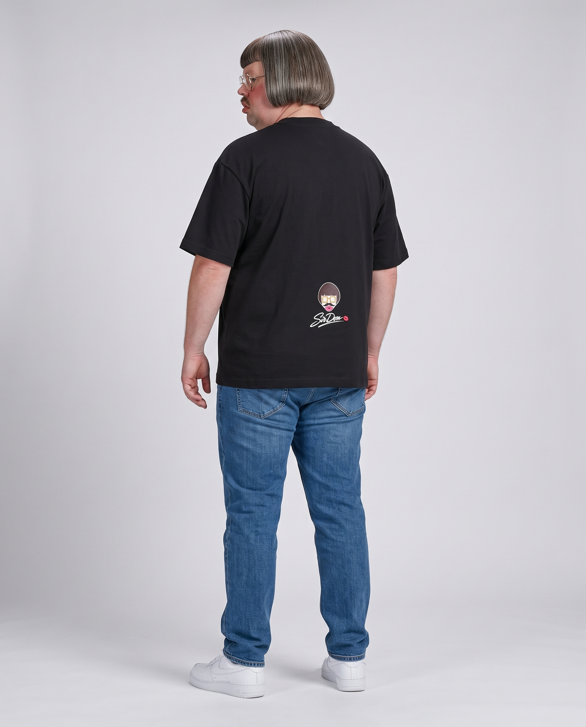 Sir Don wearing the Signature Tee - back