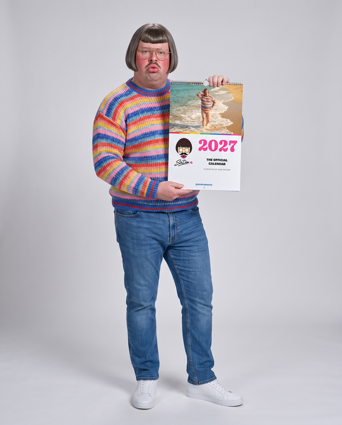 Sir Don holding the 2027 calendar